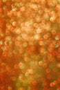 Orange abstract bokeh: water on glass