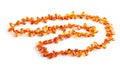 Orange amber beads isolated on white background