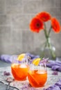 Orange Aperol Spritz cocktail served in a wine glasses