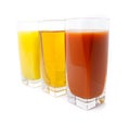 Orange apple and grape juice in glass