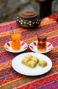 Orange and apple Turkish tea with baklawa Royalty Free Stock Photo