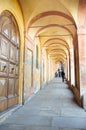 Orange arcades that lead to the sanctuary of San Luca in bologna