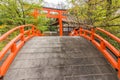 Orange arched bridge and Torii of shimogamo-jinja Royalty Free Stock Photo