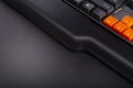 Orange arrow keys on a black keyboard, up, down, left, right buttons on a gaming computer keyboard Royalty Free Stock Photo