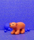 Orange baby bear toy in purple background, kids playground object, 3d Rendering Royalty Free Stock Photo