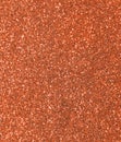 orange background with glitter on bright light