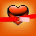 Orange background with a red heart with a strap Royalty Free Stock Photo