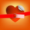 Orange background with a red heart and a strap Royalty Free Stock Photo