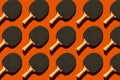 Orange background with repeating tennis rackets