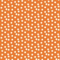 Orange background scattered dots polka seamless pattern