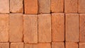 Orange baked bricks stacked together