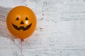Orange balloon for happy halloween on with wall backgraound in spooky party