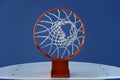 Orange basketball hoop and the blue sky Royalty Free Stock Photo