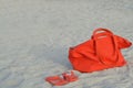 Orange beach bag and flip flops Royalty Free Stock Photo