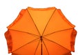 Orange beach umbrella isolated on white. Clipping path included