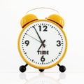 Orange and black alarm clock