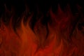 Orange and black background reminiscent of flames of fire. Inferno, the flames of hell. Royalty Free Stock Photo