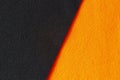 Orange and black color felt textile fabric texture background. Top view Royalty Free Stock Photo