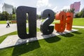 Orange black letters FC SD means Football Club Shakhtar Donetsk on background of Donbass Arena stadium. Donetsk, Ukraine Royalty Free Stock Photo