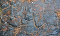 Burnt wall. Insulation foam charred on party wall. Orange and black abstract background