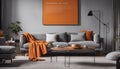 Orange blanket on grey sofa in modern apartment interior with poster and wooden table Royalty Free Stock Photo