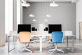 Orange and blue chairs office interior close up Royalty Free Stock Photo
