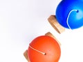 Orange and blue colorful Kendama japanese toys, isolated on white, competition concept