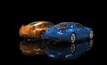 Orange and Blue Metallic Car on Black Background - Rear View Royalty Free Stock Photo