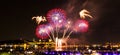 Orange, blue, and red fireworks over the Saint-Lawrence River Royalty Free Stock Photo