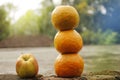 Three orange and apple with blur