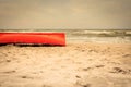 Orange boat on sandy beach Royalty Free Stock Photo