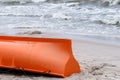 Orange boat on sandy beach Royalty Free Stock Photo