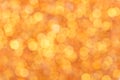 Orange bokeh background from nature under tree shade. Royalty Free Stock Photo