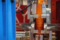 The orange bottle container manufacturing process by blow mold machine Royalty Free Stock Photo