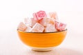 Orange bowl with diced Turkish delight Royalty Free Stock Photo