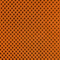 Orange breathable porous poriferous material for air ventilation with holes. Sportswear material nylon texture. Square