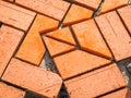 Orange brick paving stones in construction process Royalty Free Stock Photo