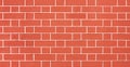Orange brick wall, light red background of masonry, plastered texture stained blocks of stonework. Royalty Free Stock Photo