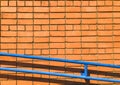 Orange brick wall. Textured background with copy space for design work. Material pattern. Reddish-brown brick blocks Royalty Free Stock Photo