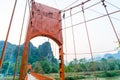 Orange bridge over song river Landmark in Vang Vieng,Laos.
