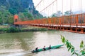 Orange bridge over song river in Vang Vieng,Laos Royalty Free Stock Photo