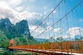 Orange bridge over song river in Vang Vieng,Laos Royalty Free Stock Photo