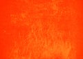Orange bright abstract background texture with scratches and spray paint. Blank background design banner. Royalty Free Stock Photo