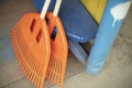 Orange broom. Cleaning tool. Garden tool