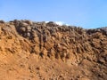 Orange-brown desert stone rock in the Sinai desert near Sharm El Sheikh, Egypt