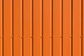 Orange brown galvanized iron metal fence bolts abstract texture background wall steel structure backdrop Royalty Free Stock Photo