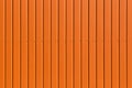 Orange brown galvanized iron metal fence bolts abstract texture background wall steel structure backdrop street Royalty Free Stock Photo