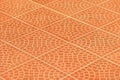 Orange brown paving slabs floor abstract pattern city street surface stone texture background tile mosaic pavement color Royalty Free Stock Photo