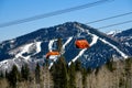 Orange bubble chair lift at Park City Canyons Ski Area in Utah. Royalty Free Stock Photo