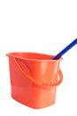 Orange bucket and mop for cleaning indoors isolated on white Royalty Free Stock Photo